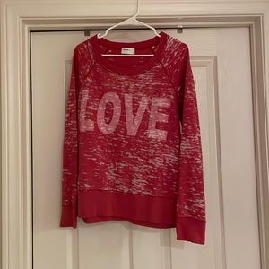 Red sweatshirt with LOVE on front. Size large